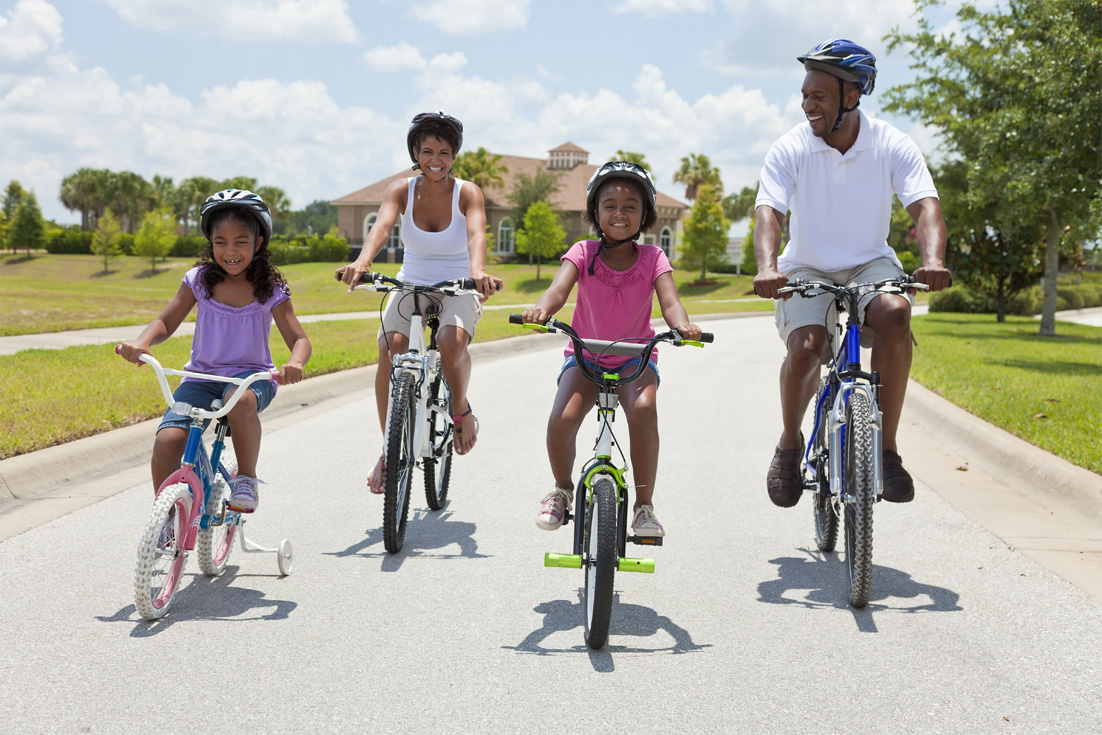 black family on bicycle ride