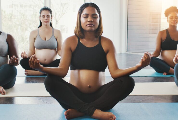 Women meditating while pregnant